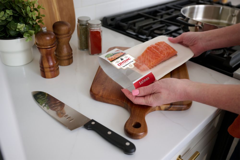 salmon on white tray with cutting board